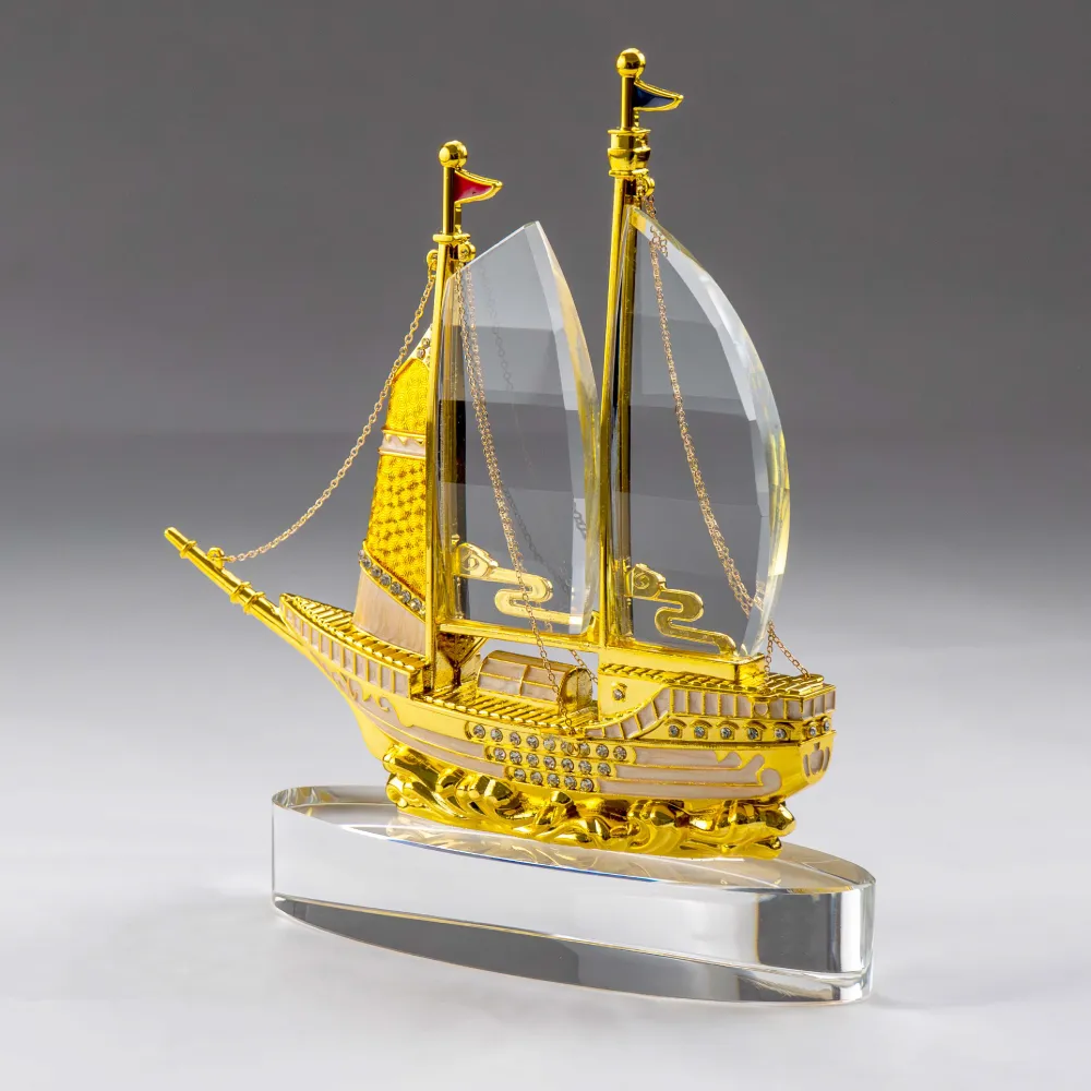Golden-Boat-Shape-Memento-in-Metal-with-Glass-Base-TR-07-Sample.webp