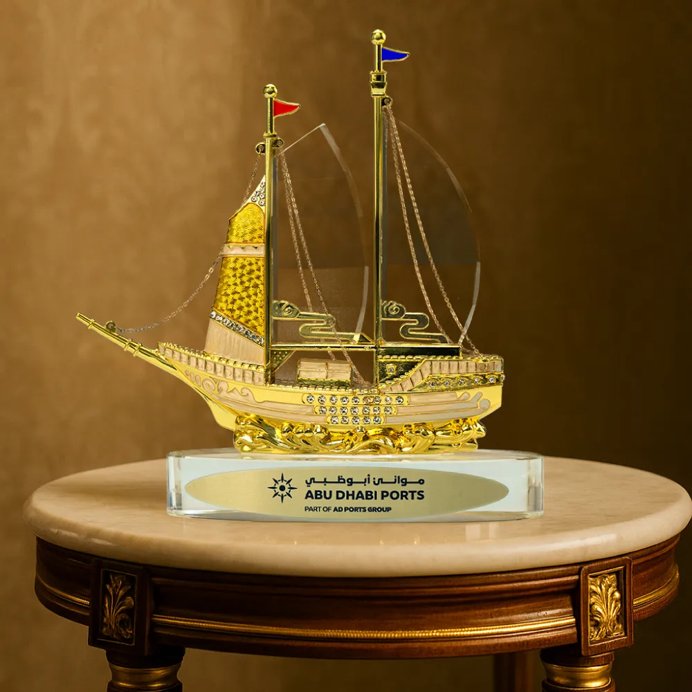 Golden-Boat-Shape-Memento-in-Metal-with-Glass-Base-TR-07-with-Print.webp